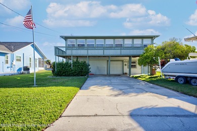 AMAZING INVESTMENT OPPORTUNITY! WATERFRONT GULF-ACCESS TROPICAL