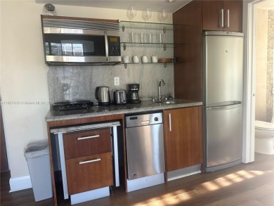 Turnkey, furnished 1BR condo in a boutique Art Deco hotel on