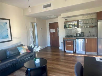 Turnkey, furnished 1BR condo in a boutique Art Deco hotel on