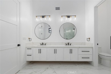 Nestled gracefully on one of the most sought-after streets in