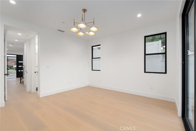 Nestled gracefully on one of the most sought-after streets in