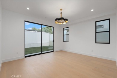 Nestled gracefully on one of the most sought-after streets in