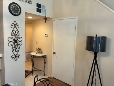 Welcome to a beatifuly designed two-level condo in a highly