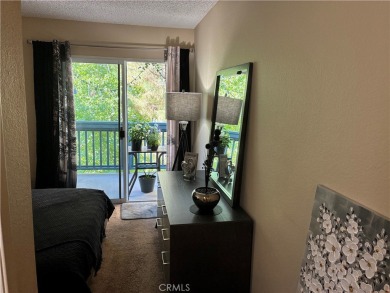 Welcome to a beatifuly designed two-level condo in a highly