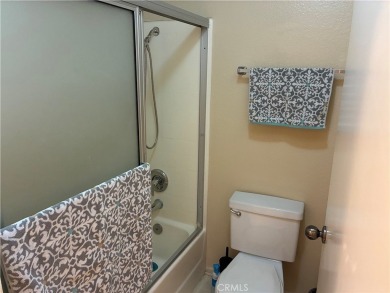 Welcome to a beatifuly designed two-level condo in a highly