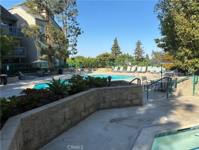 Welcome to a beatifuly designed two-level condo in a highly