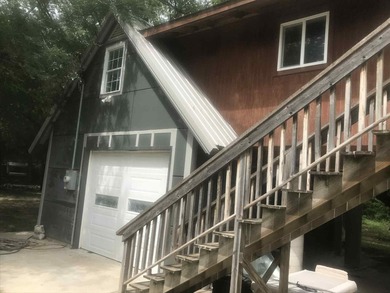 Over and acre and a half with Ninnescah river access to white