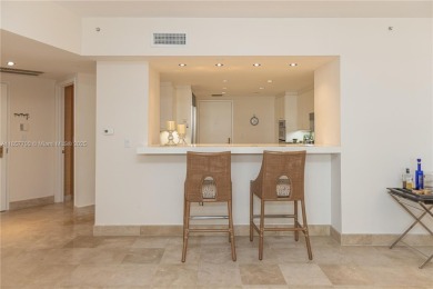 Enjoy ocean views from this beautiful spacious 1,740 SF condo