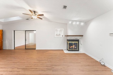 Solid brick 4-bed/2-bath with a flexible nine-room layout-living