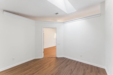 Solid brick 4-bed/2-bath with a flexible nine-room layout-living