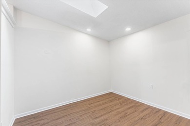 Solid brick 4-bed/2-bath with a flexible nine-room layout-living