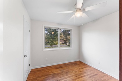 Solid brick 4-bed/2-bath with a flexible nine-room layout-living