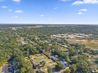 Solid brick 4-bed/2-bath with a flexible nine-room layout-living