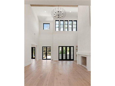 TIMELESS LUXURY & COASTAL SPLENDOR! On 1.33 acres overlooking