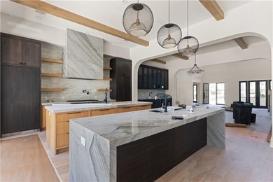 TIMELESS LUXURY & COASTAL SPLENDOR! On 1.33 acres overlooking