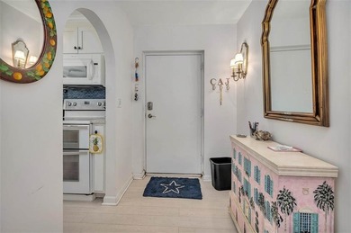 Architecturally stunning unit in the iconic Village Plaza! Built