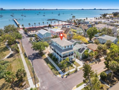 Newer construction modern coastal style home right in the heart