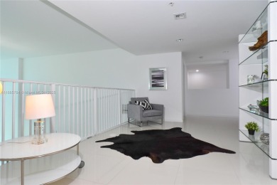 Rarely available 4-bedroom, 4-bath two-story condo with soaring