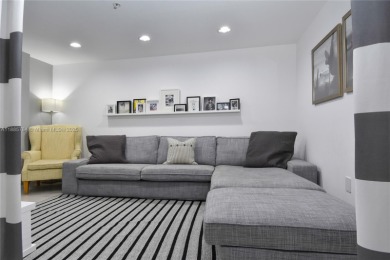 Rarely available 4-bedroom, 4-bath two-story condo with soaring