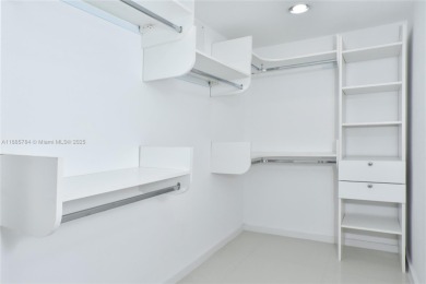 Rarely available 4-bedroom, 4-bath two-story condo with soaring