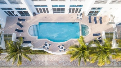 Rarely available 4-bedroom, 4-bath two-story condo with soaring