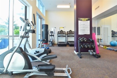 Rarely available 4-bedroom, 4-bath two-story condo with soaring