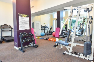 Rarely available 4-bedroom, 4-bath two-story condo with soaring