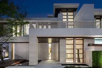 Welcome to 10 Pelican Drive--a super-custom tri-level organic