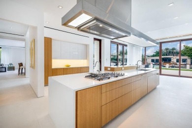 Welcome to 10 Pelican Drive--a super-custom tri-level organic