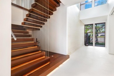 Welcome to 10 Pelican Drive--a super-custom tri-level organic