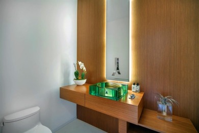 Welcome to 10 Pelican Drive--a super-custom tri-level organic