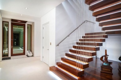 Welcome to 10 Pelican Drive--a super-custom tri-level organic