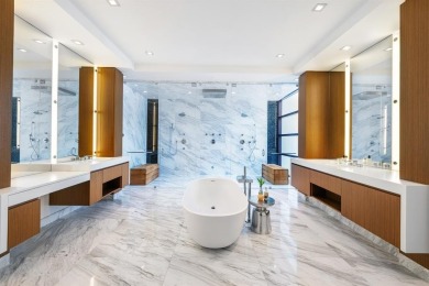 Welcome to 10 Pelican Drive--a super-custom tri-level organic