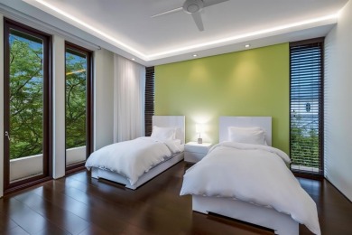 Welcome to 10 Pelican Drive--a super-custom tri-level organic