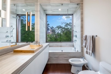 Welcome to 10 Pelican Drive--a super-custom tri-level organic