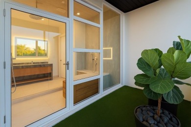 Welcome to 10 Pelican Drive--a super-custom tri-level organic