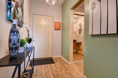 Beautiful top floor unit in a great location. Vinyl plank & tile