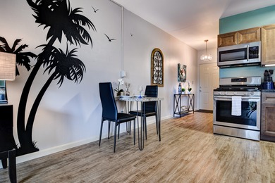 Beautiful top floor unit in a great location. Vinyl plank & tile