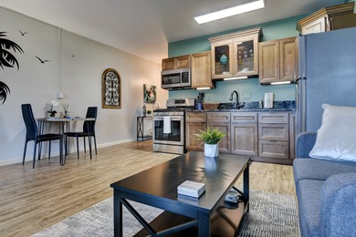 Beautiful top floor unit in a great location. Vinyl plank & tile