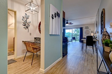 Beautiful top floor unit in a great location. Vinyl plank & tile