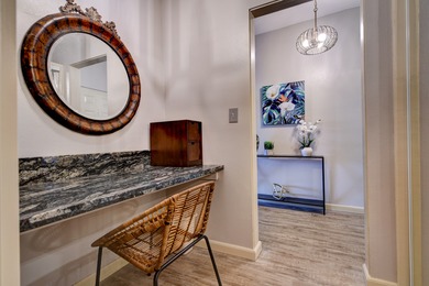 Beautiful top floor unit in a great location. Vinyl plank & tile