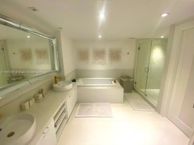 Magnificent 3 bedrooms, 3.5 baths plus Den, ocean front