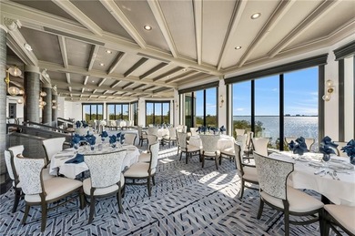 This exquisite residence boasts breathtaking views of the golf