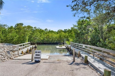 This exquisite residence boasts breathtaking views of the golf