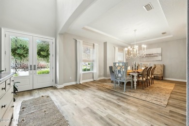 Embrace upscale, waterside living in this stunning two-story, 5