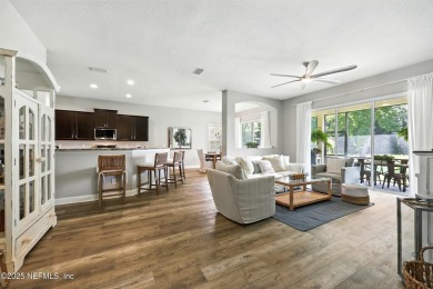 Embrace upscale, waterside living in this stunning two-story, 5