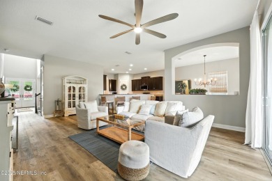 Embrace upscale, waterside living in this stunning two-story, 5