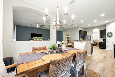 Embrace upscale, waterside living in this stunning two-story, 5