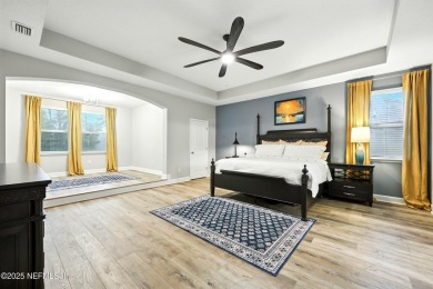 Embrace upscale, waterside living in this stunning two-story, 5