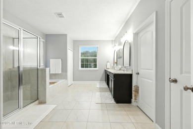 Embrace upscale, waterside living in this stunning two-story, 5